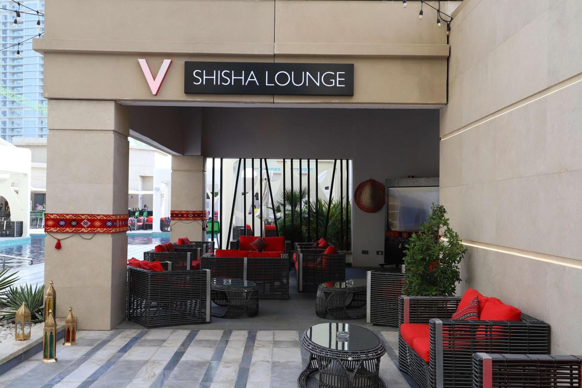 V ホテル ドバイ キュリオ コレクション バイ ヒルトン エクステリア 写真 A shisha lounge in Dubai